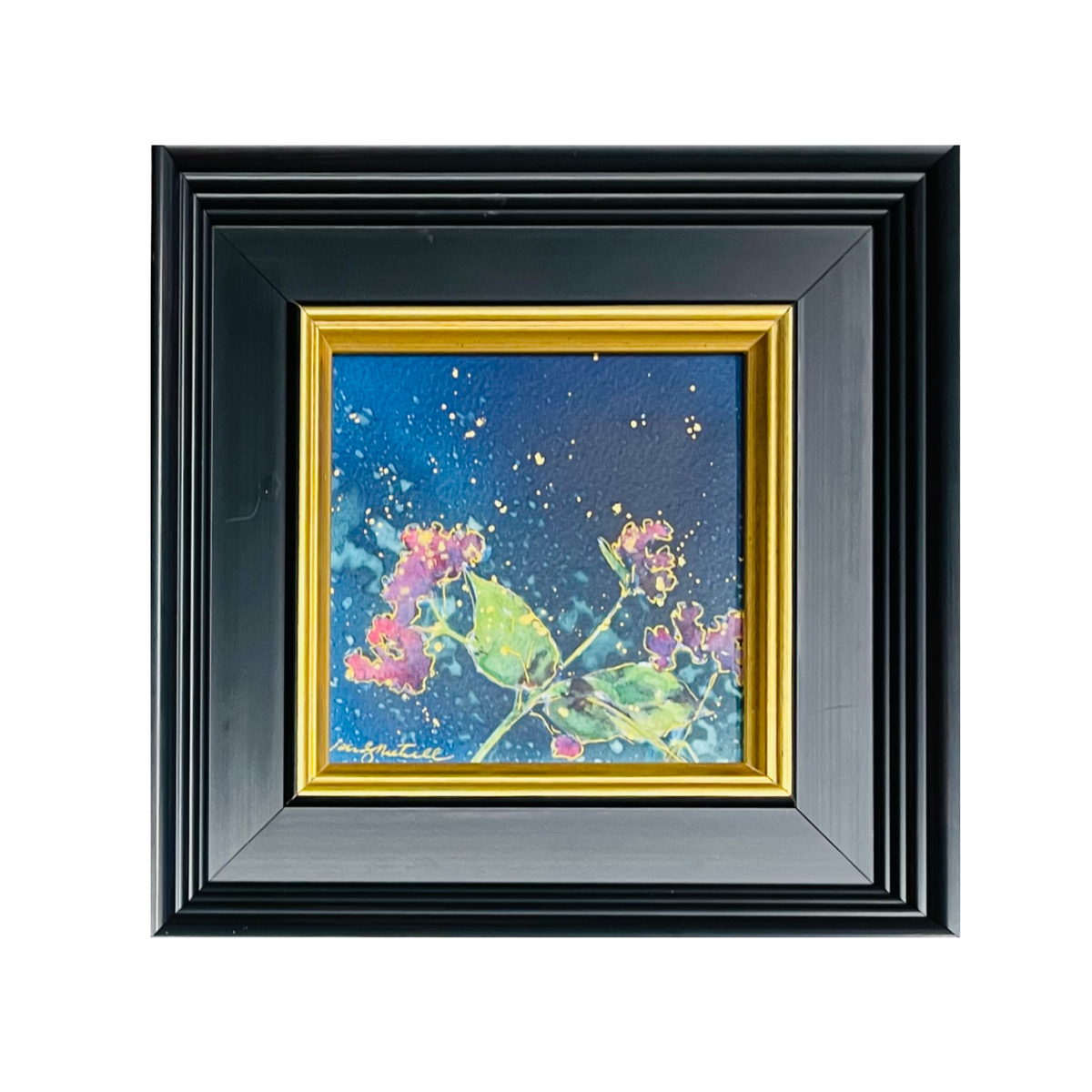 A square framed floral art print featuring pink flowers and green leaves on a blue starry background, surrounded by a gold inner frame and a wider black outer frame, shown against a plain white background.