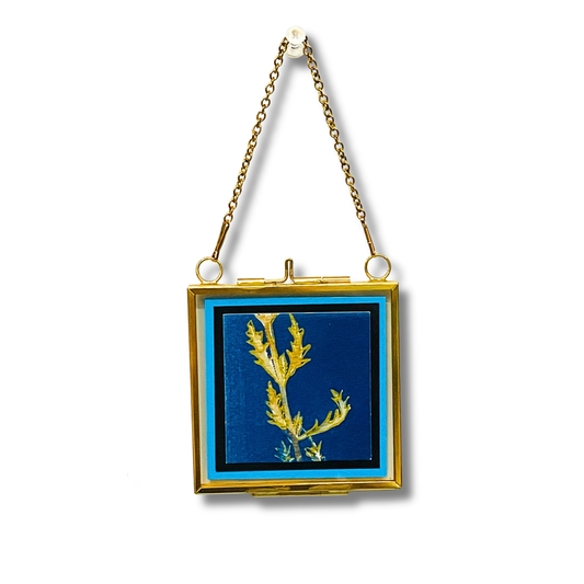 Gold plant on indigo background
